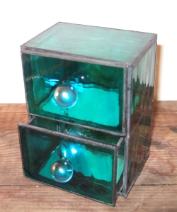 Sea green glass chest of drawers